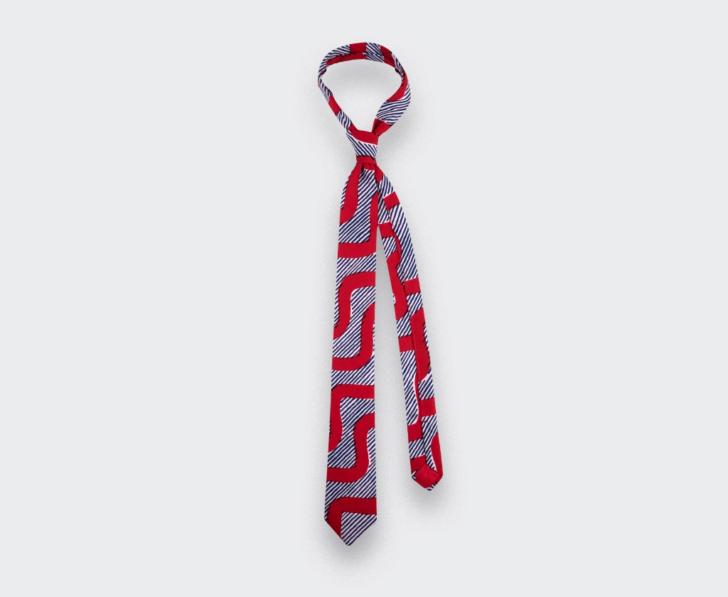 Tie Cinabre made of wax red waves. Available in Paris